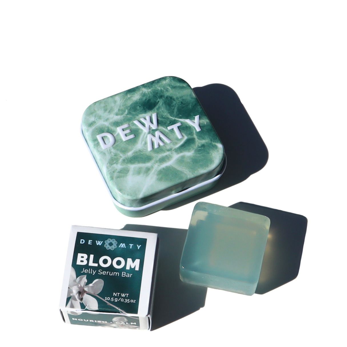 Green jelly serum bar with packaging on a white background